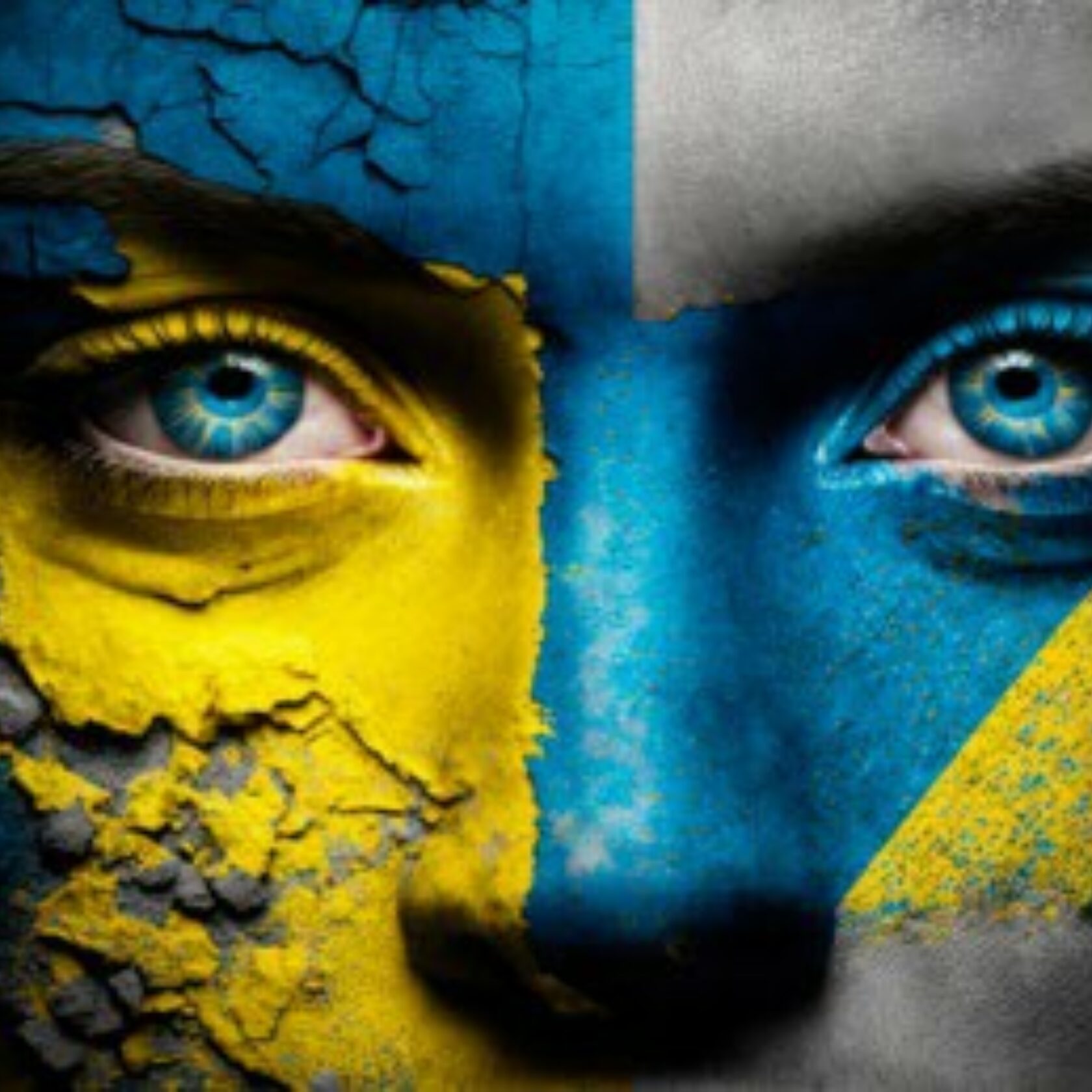In ukrainischen Nationalfarben bemaltes Gesicht von dem die Farbe bröckelt